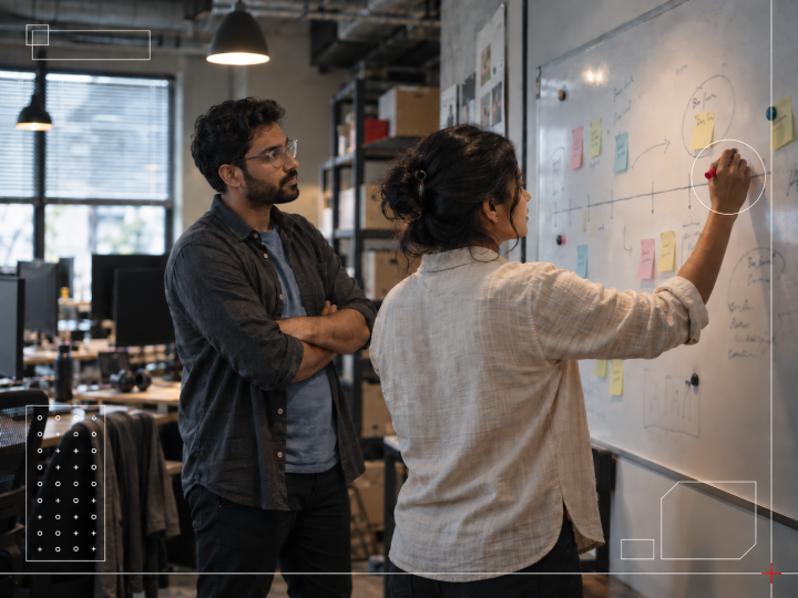 Team defining project scope, milestones, and deliverables for a fixed cost project